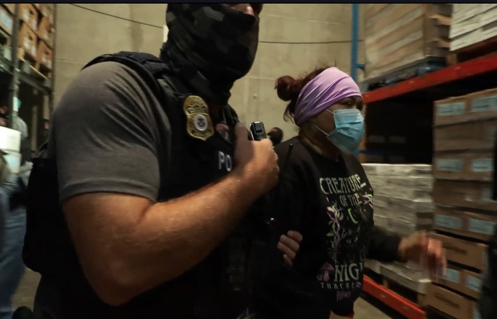 A worker gets apprehended at Glenn Valley Foods during the largest Nebraska immigration raid since President Donald Trump took office.<br /> (Courtesy of U.S. Immigration and Customs Enforcement)