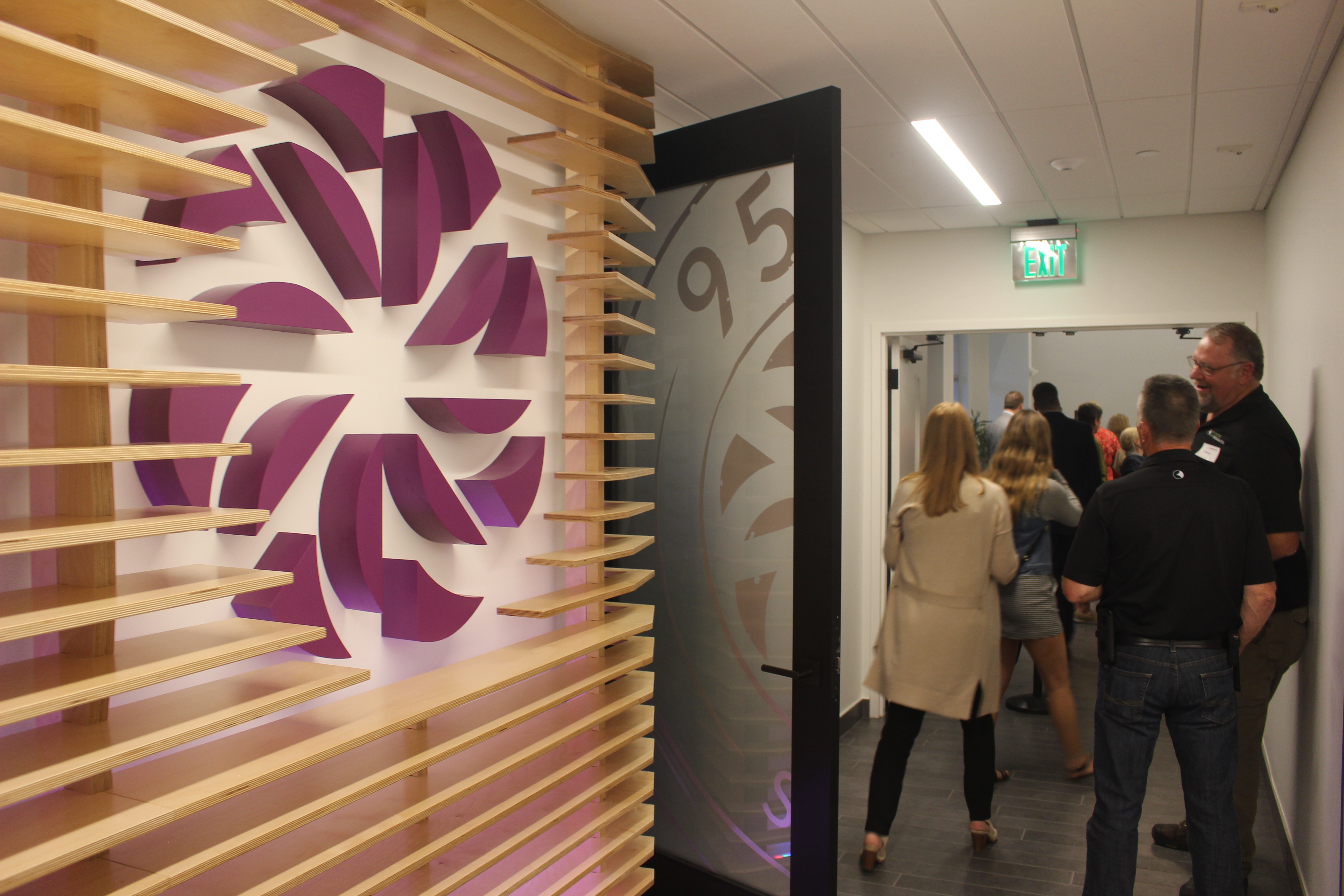 Dvorak’s logo is shown in a hallway during an open house and ribbon-cutting ceremony for Dvorak Law Group’s offices at 9500 W. Dodge Road, Suite 100, on June 18, 2019. (Scott Stewart/Daily Record)