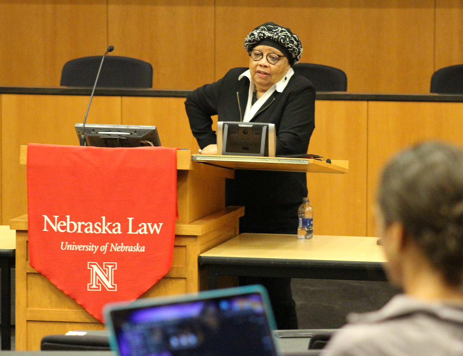 Above: University of Nebraska College of Law Acting Dean Anna Shavers welcomes 3L students back from summer break in the Hamann Auditorium in McCollum Hall on Monday, Aug. 26, 2019. (Photo by Scott Stewart)