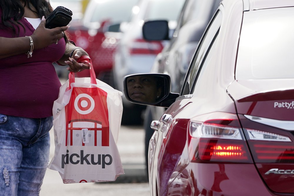 A Target employee prepares to delivery a curbside pickup purchase in Jackson, Miss., Nov. 5, 2020. (AP)