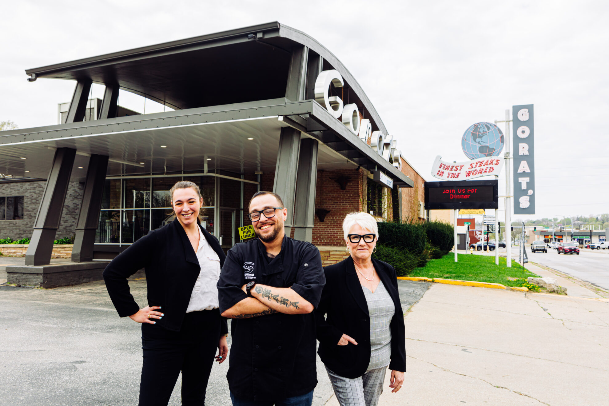 Manager Ashley Blodgett, chef Josh Saligheh and his mother and manager Cathy Saligheh pictured in front of Gorat’s Steakhouse, near 49th and Center streets.<br />(Joshua Foo / Flatwater Free Press)