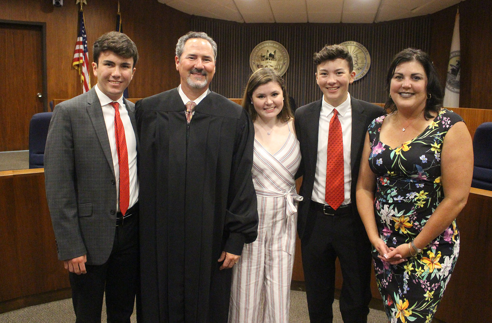 Judge Grant A. Forsberg, second from left, stands for a portrait with his children, from left, Seth, London and Devon, and wife Shawna, far right. (Photo by Scott Stewart)