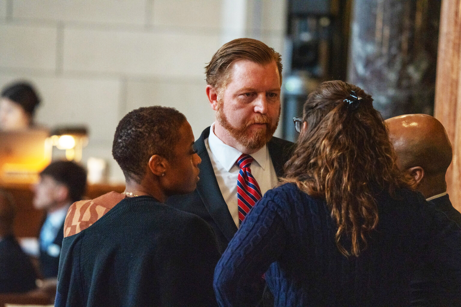 State Sen. John Cavanaugh of Omaha (center) meets with State Sens. Ashlei Spivey of Omaha, Danielle Conrad of Lincoln and Terrell McKinney of Omaha, from left, March 26, 2025.<br />(Zach Wendling / Nebraska Examiner)
