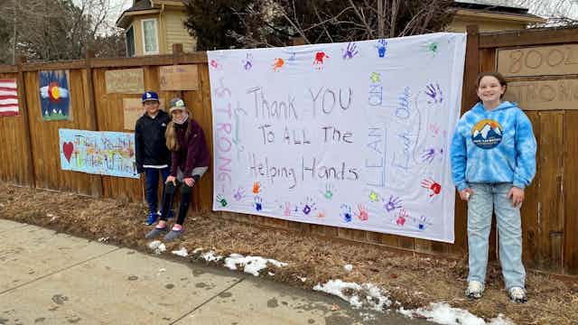 The Marshall Fire impacted people of all ages. Rebecca Slusar organized her children and their friends in the neighborhood to paint signs of community resilience and thanking first responders.<br />(Courtesy of the Louisville Historical Museum)