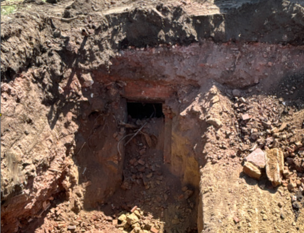 A tunnel discovered under the ground near 27th and Leavenworth Street where an apartment building is to rise. Developers said building data had no record.<br />(Courtesy of Hausmann Construction)