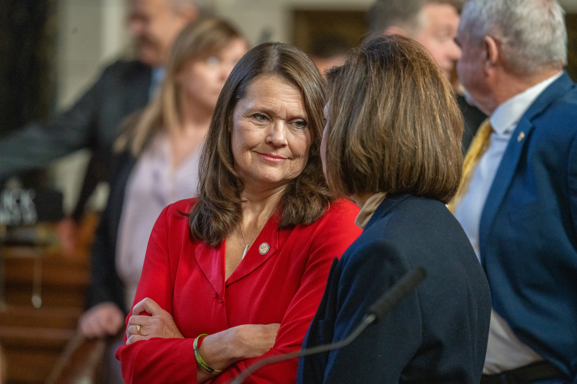 State Sen. Kathleen Kauth of the Millard area (left) talks with State Sen. Teresa Ibach of Sumner, Jan. 8, 2025.<br />(Zach Wendling / Nebraska Examiner)