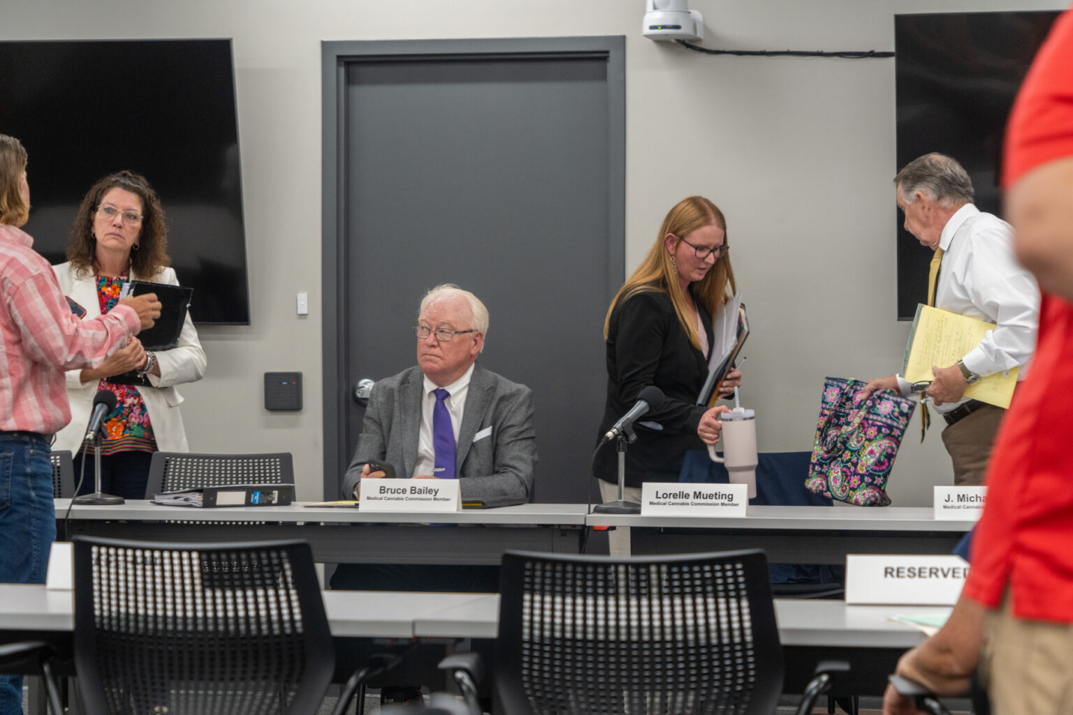 The Nebraska Medical Cannabis Commission members, from left: Commissioners Kim Lowe of Kearney, Bruce Bailey of Lincoln, Lorelle Mueting of Gretna and J. Michael Coffey of Omaha on Aug 4, 2025.<br />(Zach Wendling / Nebraska Examiner)