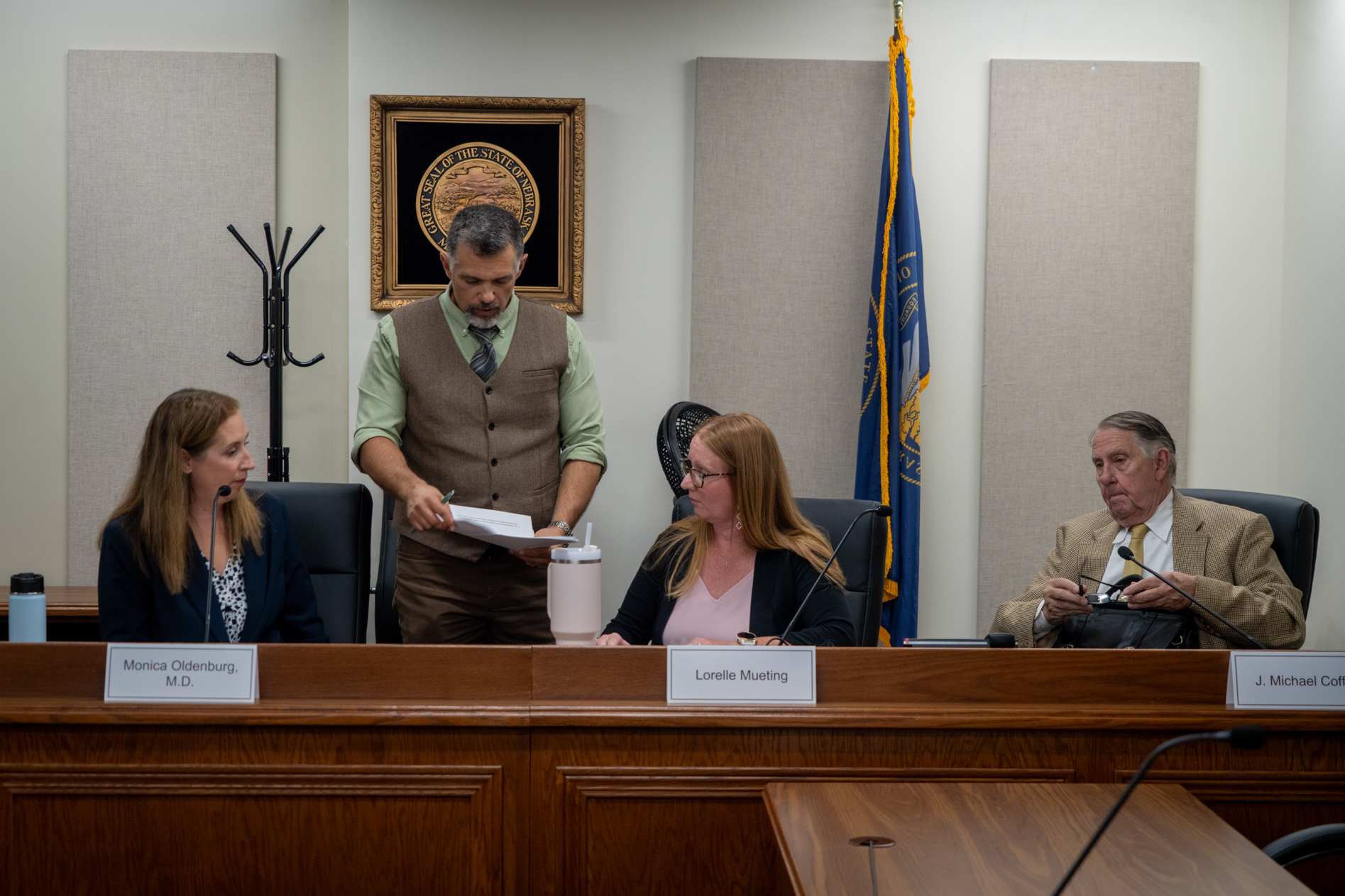Commissioners Dr. Monica Oldenburg of Lincoln, Lorelle Mueting of Gretna and retired Judge J. Michael Coffey of the Nebraska Medical Cannabis Commission on Oct. 7, 2025.<br />(Zach Wendling / Nebraska Examiner)