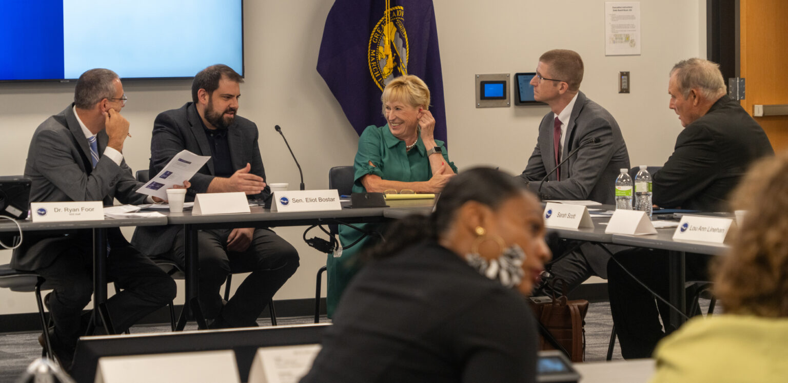 From left: Superintendent Aaron Plas of Bennington Public Schools, State Sen. Eliot Bostar of Lincoln, former State Sen. Lou Ann Linehan of the Elkhorn area, Superintendent John Schwartz of Millard Public Schools and Lakeview Community School Board President Keith Runge meet during the inaugural meeting of the Nebraska School Financing Review Commission on Aug. 12, 2025.<br />(Zach Wendling / Nebraska Examiner)