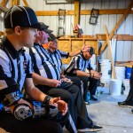 From left: referees Sam Roberts, Mike Hagge, Matt Hagge, Joshua Adams and J.D. Koerner talk during halftime of a football game on Aug. 28 in Laurel. At the age of 20, Roberts is believed to be the youngest full-time varsity high school football official in Nebraska.
(Darin Epperly / Flatwater Free Press)