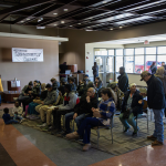 People seeking assistance after the Tyson closure wait their turn in the lobby of the Dawson County Opportunity Center on Jan. 26. The local unemployment office estimated that staff helped 500 people in just two days. 
(Brian Neben / Flatwater Free Press)