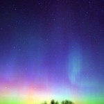 The aurora borealis lights up the night sky north of Dunkerton, Iowa, Sunday night, Nov. 7, 2004. 
(Brandon Pollock / Waterloo Courier / AP Photo)