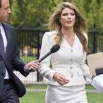 Lindsey Halligan, special assistant to the president, speaks with a reporter outside of the White House, Wednesday, Aug. 20, 2025, in Washington. 
(Jacquelyn Martin / AP Photo)
