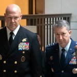 U.S. Navy Adm. Frank M. Bradley, accompanied by Gen. Dan Caine, chairman of the Joint Chiefs of Staff (right) walks to a meeting with senators on Capitol Hill, Thursday, Dec. 4, 2025, in Washington.
(Mark Schiefelbein / AP Photo)