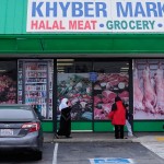 Women and children exit an Afghan grocery store in North Highlands, Calif., Friday, Dec. 5, 2025.
(Godofredo A. Vásquez / AP Photo)