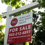 A sign is displayed outside a home for sale on Tuesday, May 12, 2026, in Portland, Ore.
(Jenny Kane / AP Photo)