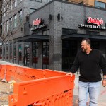 Addy’s Sports Bar and Grill owner Tim Addison stands next to the construction work that has disrupted business at his location in Omaha’s Capitol District.
(Naomi Delkamiller / Flatwater Free Press)