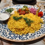 A plate of rice and pickled vegetables from Clio in the Old Market off 12th and Howard streets.
(Austin Petak / The Daily Record)