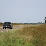 A pickup passes by the Flock camera located along Highway 136, near the Harlan County-Franklin County line east of Republican City. 
(Brian Neben / Flatwater Free Press)