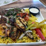 The stunning Zaytuna Mix consists of light rice, temperate beef, seared chicken, wonderful pickles and perhaps the best tomato in Omaha. 
(Austin Petak / The Daily Record)