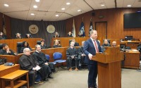 Hon. Richard McGowan discusses the importance and honor of serving as a judge, while other Douglas County judges listen. 
(Tim Trudell / The Daily Record)