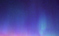 The aurora borealis lights up the night sky north of Dunkerton, Iowa, Sunday night, Nov. 7, 2004. 
(Brandon Pollock / Waterloo Courier / AP Photo)