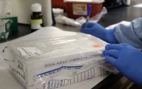 In this April 2, 2015 photo, a sexual assault evidence kit is logged in the biology lab at the Houston Forensic Science Center in Houston. 
 (Pat Sullivan / AP Photo)