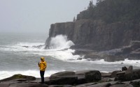 Chris Crawford, of Mount Desert Island, Maine, films the raging surf near Otter Point in Acadia National Park as severe weather associated with storm Lee pounds the region, Saturday, Sept. 16, 2023, in Bar Harbor, Maine. 
(Robert F. Bukaty / AP Photo)