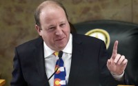 Colorado Gov. Jared Polis speaks in the House of Representatives chamber in the State Capitol, Jan. 17, 2023, in Denver. 
(David Zalubowski / AP Photo)