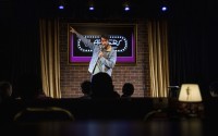 Esteban Gast performs during Stand Up For Climate, a comedy show at Flappers Comedy on Thursday, March 20, 2025, in Burbank, Calif. 
(Ethan Swope / AP Photo)