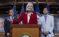 Rep. Katherine Clark, D-Mass., the House minority whip (center).
(J. Scott Applewhite / AP Photo)