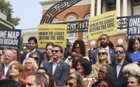 Democratic state lawmakers from across the U.S. and their supporters protest outside the Massachusetts State House on Wednesday, Aug. 6, 2025 in Boston. 
(Leah Willingham / AP Photo)