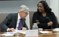 Federal Reserve Chairman Jerome Powell (left)talks with Board of Governors member Lisa Cook (right) during an open meeting of the Board of Governors at the Federal Reserve, June 25, 2025, in Washington. 
(Mark Schiefelbein / AP Photo)