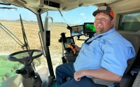 Kentucky Farmer Caleb Ragland sits in his combine while harvesting corn in Magnolia, Ky., Sept. 12, 2025. 
(Dylan Lovan / AP Photo)