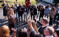 White House press secretary Karoline Leavitt speaks with reporters at the White House, Thursday, Oct. 2, 2025, in Washington. 
(Evan Vucci / AP Photo)