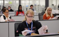 A worker examines ballots at the L.A. County Ballot Processing Center Nov. 4, 2025, in City of Industry, Calif. 
(Ethan Swope / AP Photo)