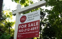 A sign is displayed outside a home for sale on Tuesday, May 12, 2026, in Portland, Ore. 
(Jenny Kane / AP Photo)