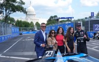 Kyle Kirkwood (right) poses for a photo with Transportation Secretary Sean Duffy (left) after winning the IndyCar Freedom 250 Grand Prix auto race in Washington, Sunday, Aug. 23, 2026. 
(Alex Brandon / AP Photo)