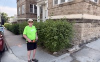 Chuck Martens does landscaping at his apartment complex in Omaha to afford rent. 
(Noelle Annonen / Nebraska Public Media News)
