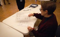 Kathy Disney prepares ballots for voters at the Sower Church on Tuesday, Nov. 5, 2024, in Lincoln, Neb. 
(Sophia Walsh / Nebraska News Service)