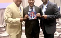 Mayor-elect John Ewing with Anthony and Anton Downing at the Reignite2Unite developer symposium, at which all three spoke. 
(Courtesy of Erin Grace)