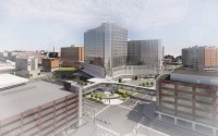 Rendering of the future Project Health facility — the glass structure connected by pedestrian skywalks to a future parking garage and the CORE building that’s under construction on the west side of Saddle Creek Road in what is dubbed The Edge District. 
(Courtesy of University of Nebraska Medical Center)
