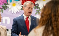 Nebraska Gov. Jim Pilen talks with reporters during a visit with U.S. Education Secretary Linda McMahon to Hamlow Elementary School in Waverly, Nebraska. April 9, 2026. 
(Zach Wendling / Nebraska Examiner)