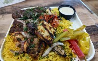 The stunning Zaytuna Mix consists of light rice, temperate beef, seared chicken, wonderful pickles and perhaps the best tomato in Omaha. 
(Austin Petak / The Daily Record)