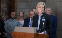 State Sen. Lynne Walz of Fremont, center, leads a news conference in the Nebraska Capitol Rotunda, March 16, 2022. 
(Zach Wendling / Nebraska News Service)