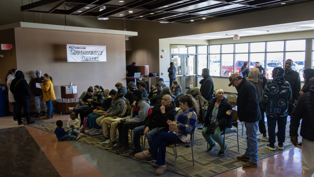 People seeking assistance after the Tyson closure wait their turn in the lobby of the Dawson County Opportunity Center on Jan. 26. The local unemployment office estimated that staff helped 500 people in just two days. 
(Brian Neben / Flatwater Free Press)