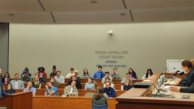 David Mabes discusses the role of New York Times v. Sullivan during oral arguments as part of Creighton University’s Moot Court championship hearing. 
(Tim Trudell / The Daily Record)