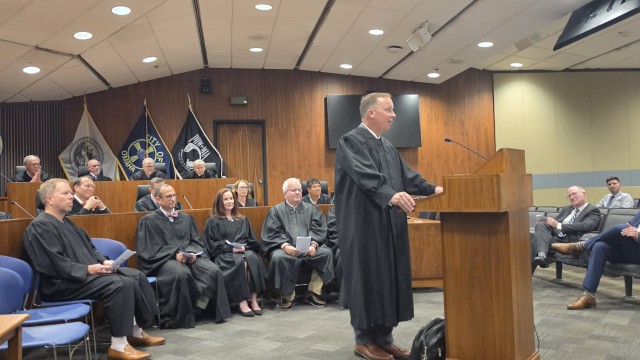 Judge Michael W. Jensen discusses his path to his judicial appointment before other judges from the Fourth District and Douglas County.
(Tim Trudell / The Daily Record)