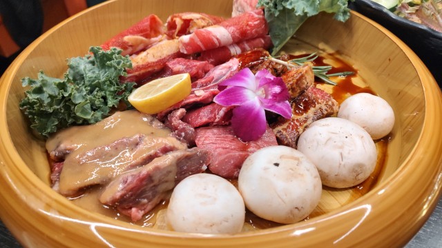 (Most) of the Koen Premium. When the waiter dropped the platter off and moved some meat onto the grill to show how it worked. I didn't want to be an awkward Instagram-foodie and beg them to wait until I took a picture. Ha!  This was easily enough food for two grown men. 
(Austin Petak / The Daily Record)