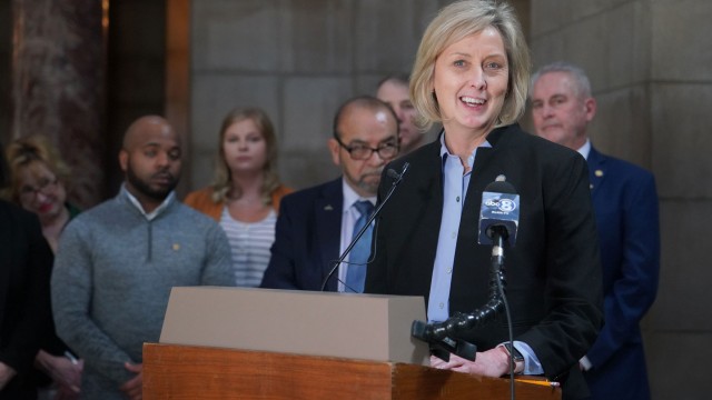 State Sen. Lynne Walz of Fremont, center, leads a news conference in the Nebraska Capitol Rotunda, March 16, 2022. 
(Zach Wendling / Nebraska News Service)